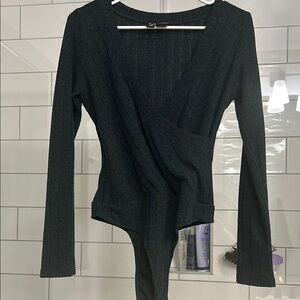 Elegant dark green bodysuit